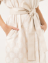Картинка Бежева сукня-сорочка з візерунком